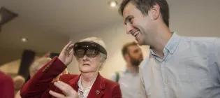 Lothian Birth Cohorts researcher with participant with AR glasses