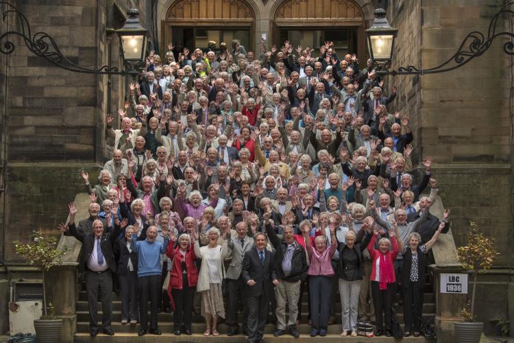 Cheerful group of LBC participants on steps